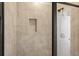 Clean shower with tile surround and built-in niche at 314 Cornett Way, Lawrenceville, GA 30046