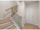 Modern staircase with wood and metal accents at 314 Cornett Way, Lawrenceville, GA 30046