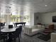 Bright community room with billiard table, comfortable seating, and outdoor views at 2479 Peachtree Ne Rd # 105, Atlanta, GA 30305