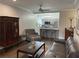 Living room view showcases updated kitchen, chair, and hardwood floors at 2479 Peachtree Ne Rd # 105, Atlanta, GA 30305