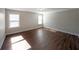 Spacious bedroom with hardwood floors and large windows at 1079 Bar Harbor Pl, Lawrenceville, GA 30044