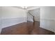 Bright dining room with hardwood floors and wainscoting at 1079 Bar Harbor Pl, Lawrenceville, GA 30044