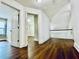 Upstairs hallway with hardwood floors and access to bedrooms at 1079 Bar Harbor Pl, Lawrenceville, GA 30044