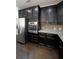 Kitchen with dark cabinetry and stainless steel appliances at 1079 Bar Harbor Pl, Lawrenceville, GA 30044