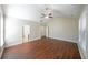 Large main bedroom with hardwood floors and access to bathroom at 1079 Bar Harbor Pl, Lawrenceville, GA 30044