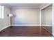 Well-lit bedroom featuring hardwood floors and mirrored closet at 215 Piedmont Ne Ave # 502, Atlanta, GA 30308