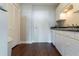 Kitchen with white cabinets and dark floors at 215 Piedmont Ne Ave # 502, Atlanta, GA 30308