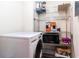 Laundry area with washer, dryer, and metal shelving for storage at 215 Piedmont Ne Ave # 502, Atlanta, GA 30308