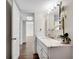 Bright bathroom with marble vanity and updated fixtures at 2870 Pharr Court South Nw # 2002, Atlanta, GA 30305