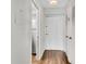 White entryway with tile floors and built-in storage at 2870 Pharr Court South Nw # 2002, Atlanta, GA 30305