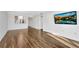 Bright living room with wood-look floors and city views at 2870 Pharr Court South Nw # 2002, Atlanta, GA 30305