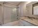 Clean bathroom with white subway tile shower and granite vanity at 1204 Westridge Sw Rd, Atlanta, GA 30311