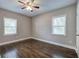 Simple bedroom with hardwood floors and neutral walls at 1204 Westridge Sw Rd, Atlanta, GA 30311