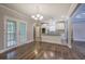 Dining area with hardwood floors and French doors at 1204 Westridge Sw Rd, Atlanta, GA 30311