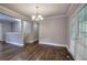 Formal dining room with hardwood floors and chandelier at 1204 Westridge Sw Rd, Atlanta, GA 30311