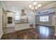 Open concept kitchen with island and hardwood floors at 1204 Westridge Sw Rd, Atlanta, GA 30311