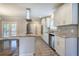 Modern kitchen with granite countertops and stainless steel appliances at 1204 Westridge Sw Rd, Atlanta, GA 30311