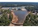 Aerial view of lake, bridge, and recreational facilities at 1979 Spivey Village Dr, Jonesboro, GA 30236