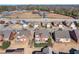 Aerial view showcasing a home with a backyard and surrounding neighborhood at 1979 Spivey Village Dr, Jonesboro, GA 30236