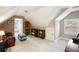 Large bonus room with vaulted ceiling, perfect for an office or playroom at 1979 Spivey Village Dr, Jonesboro, GA 30236