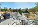 Deck with table and chairs, overlooks backyard at 1979 Spivey Village Dr, Jonesboro, GA 30236