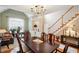 Spacious dining area with hardwood floors and a view of the living room at 1979 Spivey Village Dr, Jonesboro, GA 30236