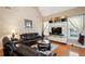Living room with built-in entertainment center and hardwood floors at 1979 Spivey Village Dr, Jonesboro, GA 30236