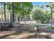 Relaxing park area with picnic tables and grills at 1979 Spivey Village Dr, Jonesboro, GA 30236