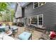 Inviting backyard deck with outdoor seating and view of the home's exterior at 4250 Edgewater Nw Ct, Kennesaw, GA 30144