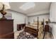 Cozy bedroom featuring a bed, dresser and desk with dimmable, soft lighting at 4250 Edgewater Nw Ct, Kennesaw, GA 30144