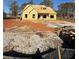 New construction home with a large lot and unfinished landscaping at 1471 Stephens View Dr, Loganville, GA 30052