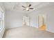 Primary bedroom with ceiling fan and carpet flooring at 1461 Stephens View Dr, Loganville, GA 30052