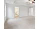 Main bedroom with carpeting and an ensuite bathroom at 3603 Squires Park Ln, Loganville, GA 30052