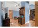 Upstairs bedroom with wood flooring and built-in shelving at 1045 N Main Nw St, Conyers, GA 30012