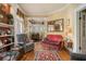 Relaxing sitting area with hardwood floors and built in bookshelves at 1045 N Main Nw St, Conyers, GA 30012