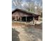 Carport featuring an SUV in front of a home at 1685 Dogwood Trl, Douglasville, GA 30134
