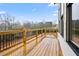 Wooden deck with black metal railing overlooking the yard at 3816 Havenrock Drive, Marietta, GA 30066