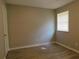This bedroom is well lit with a neutral color scheme at 99 Libby Ln, Jonesboro, GA 30238