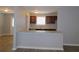 Modern kitchen featuring ample countertop space with dark cabinetry and modern hardware at 99 Libby Ln, Jonesboro, GA 30238