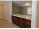 Eat-in kitchen features granite countertops and wood cabinetry at 99 Libby Ln, Jonesboro, GA 30238