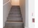 The staircase features wood look stairs at 99 Libby Ln, Jonesboro, GA 30238
