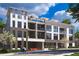 Contemporary building boasts modern architecture, balconies, and a rooftop terrace for luxury living at 318 Sandy Springs Cir # 310, Sandy Springs, GA 30328
