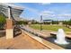 Outdoor space with a water fountain and lush green area, with buildings visible in the background at 318 Sandy Springs Cir # 310, Sandy Springs, GA 30328