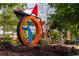 Outdoor sculpture in a park-like setting, surrounded by green foliage and walking paths at 318 Sandy Springs Cir # 310, Sandy Springs, GA 30328