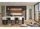 Modern kitchen features an island with seating, stainless steel appliances, and sleek cabinetry at 318 Sandy Springs Cir # 310, Sandy Springs, GA 30328