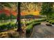Picturesque waterfront view with landscaped grounds and a tranquil river scene, perfect for enjoying peaceful sunsets at 318 Sandy Springs Cir # 310, Sandy Springs, GA 30328