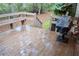 View of wooden back deck, with room for seating and a grill at 25 Ridgeview Dr, Jonesboro, GA 30236