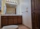 Bathroom featuring a vanity, mirror and tile flooring at 25 Ridgeview Dr, Jonesboro, GA 30236