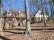 Charming two-story house with a brick facade, dormer windows, and a welcoming front porch at 25 Ridgeview Dr, Jonesboro, GA 30236