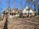 Charming two-story house with a brick facade, dormer windows, and a welcoming front porch at 25 Ridgeview Dr, Jonesboro, GA 30236